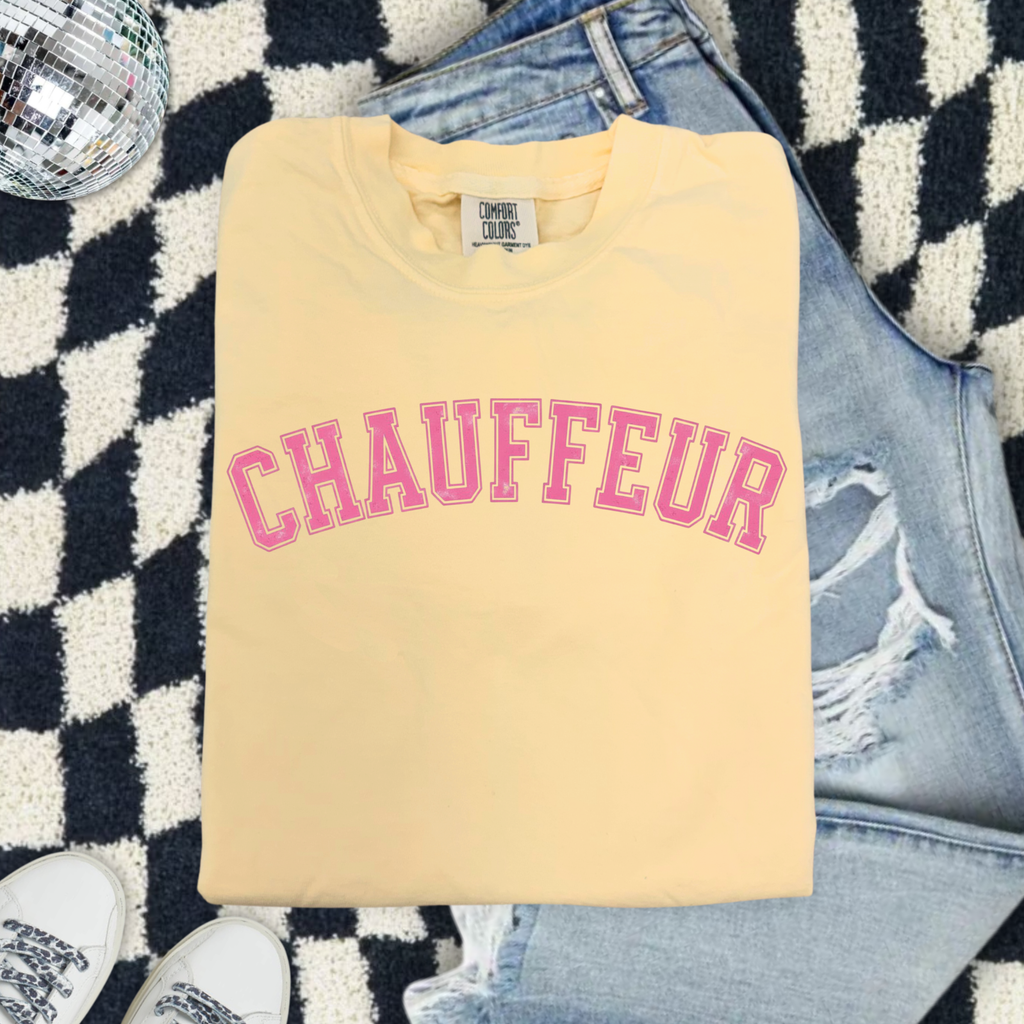 Chauffeur (Because we are sports moms) Graphic T-Shirt — Vintage Garment-Dyed Pink Lettering